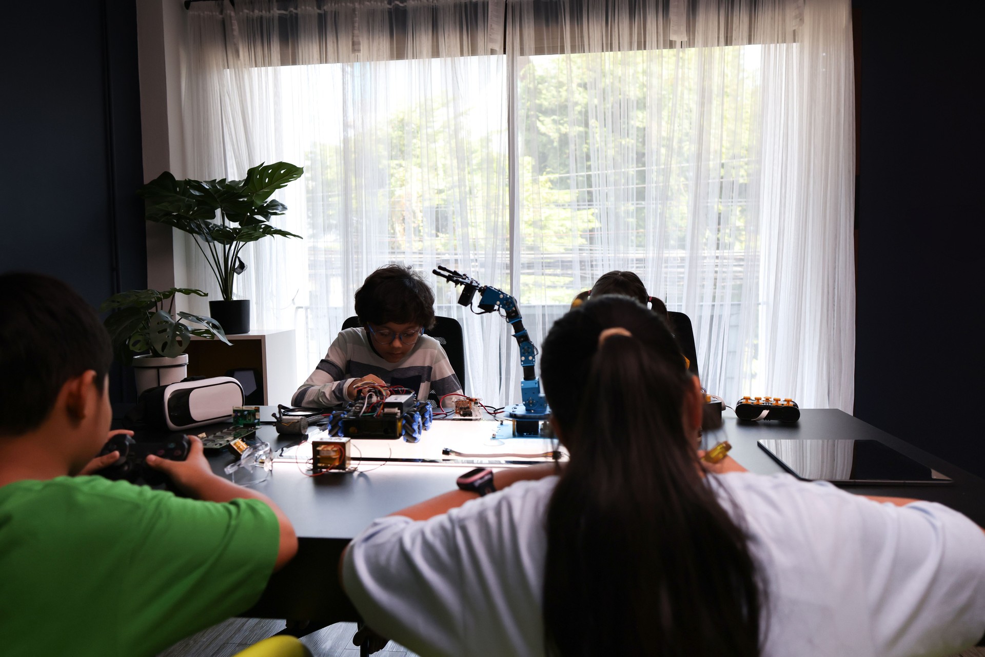 In a computer coding class, students will build and program a robot vehicle using a robot kit.